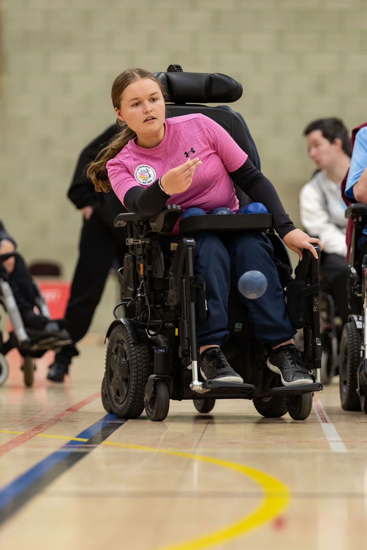 mid swing of boccia player