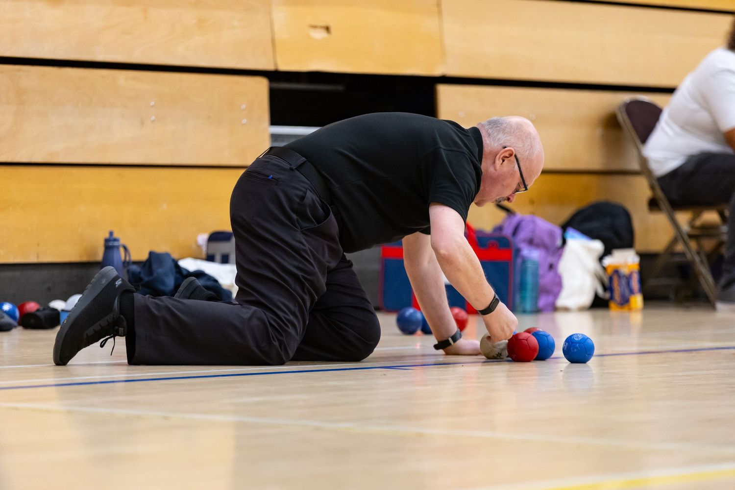 referee measuring boccia balls