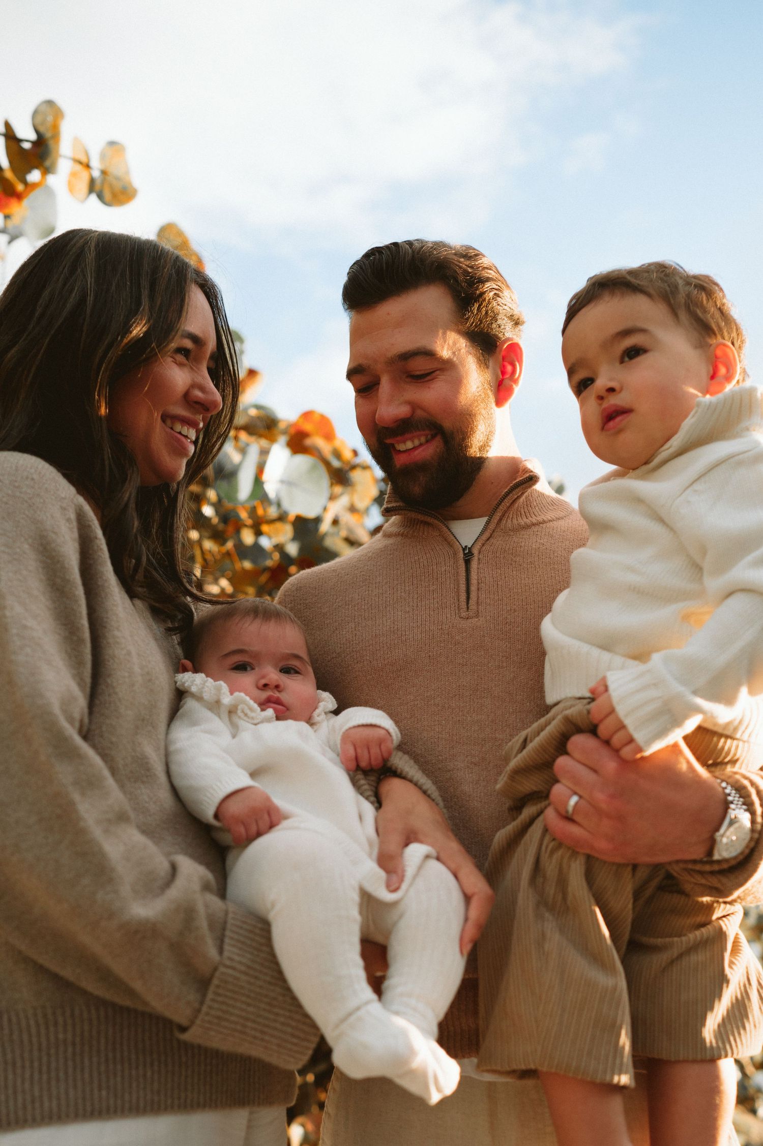 Miami family photographer capturing a joyful family at sunrise