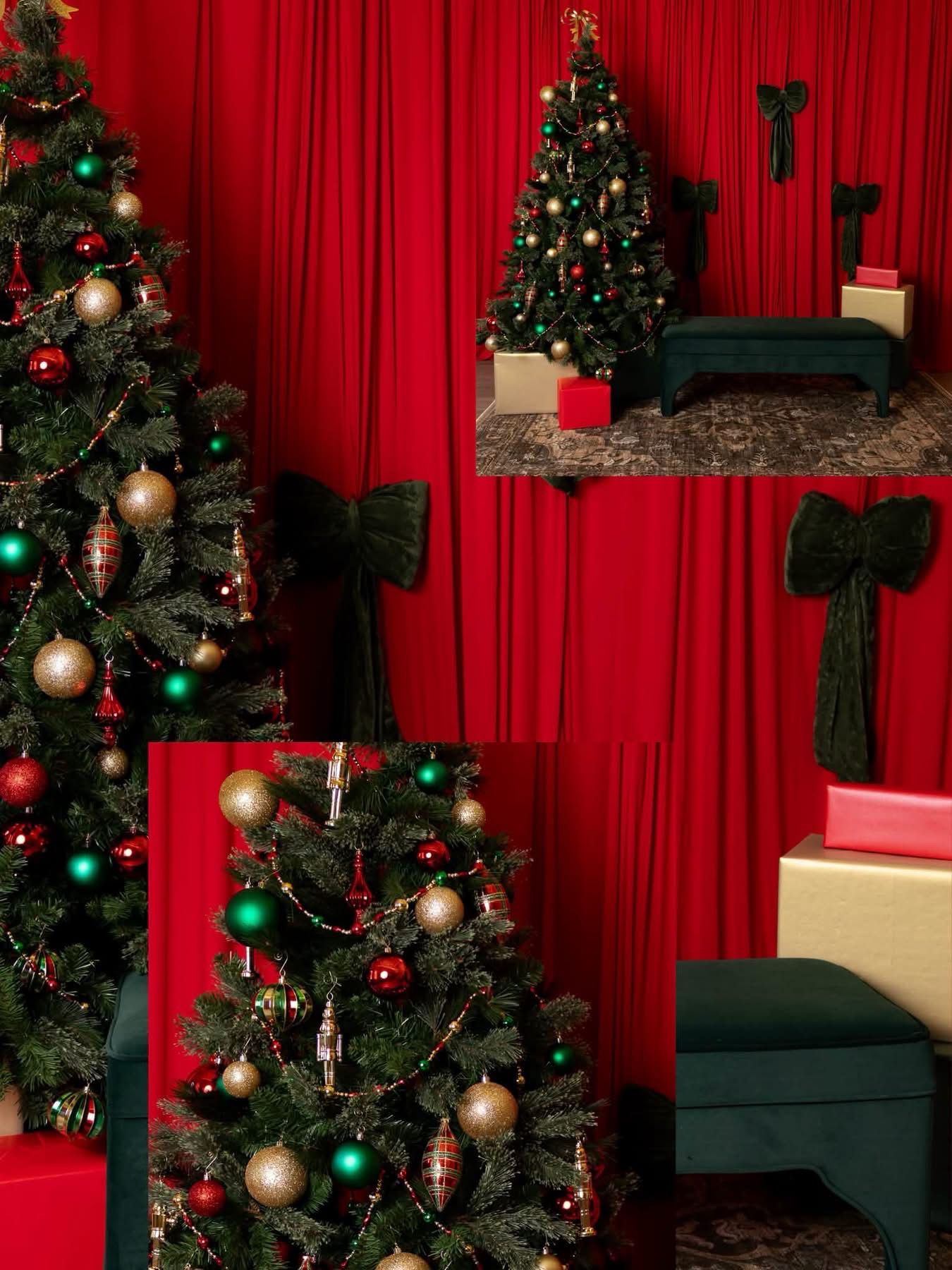 Decorated Christmas tree with red, green and gold ornaments beside a green velvet bench, red curtains and dark green bows.