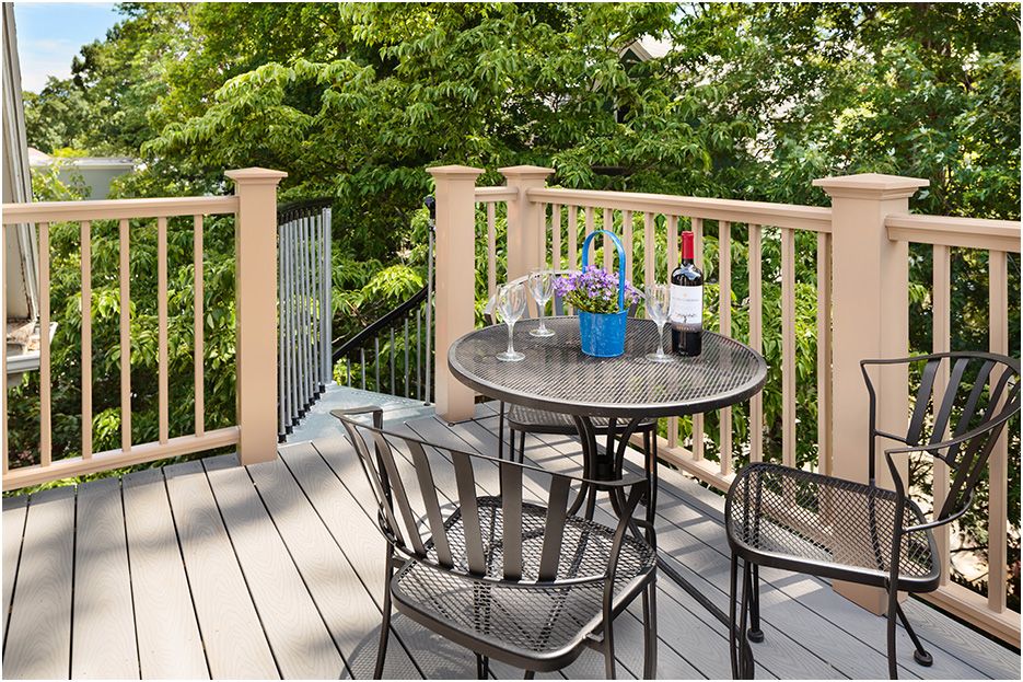 Architectural photograph of Boston area contractor Charlie Allens Cambridge residential renovation project showing rear deck with table