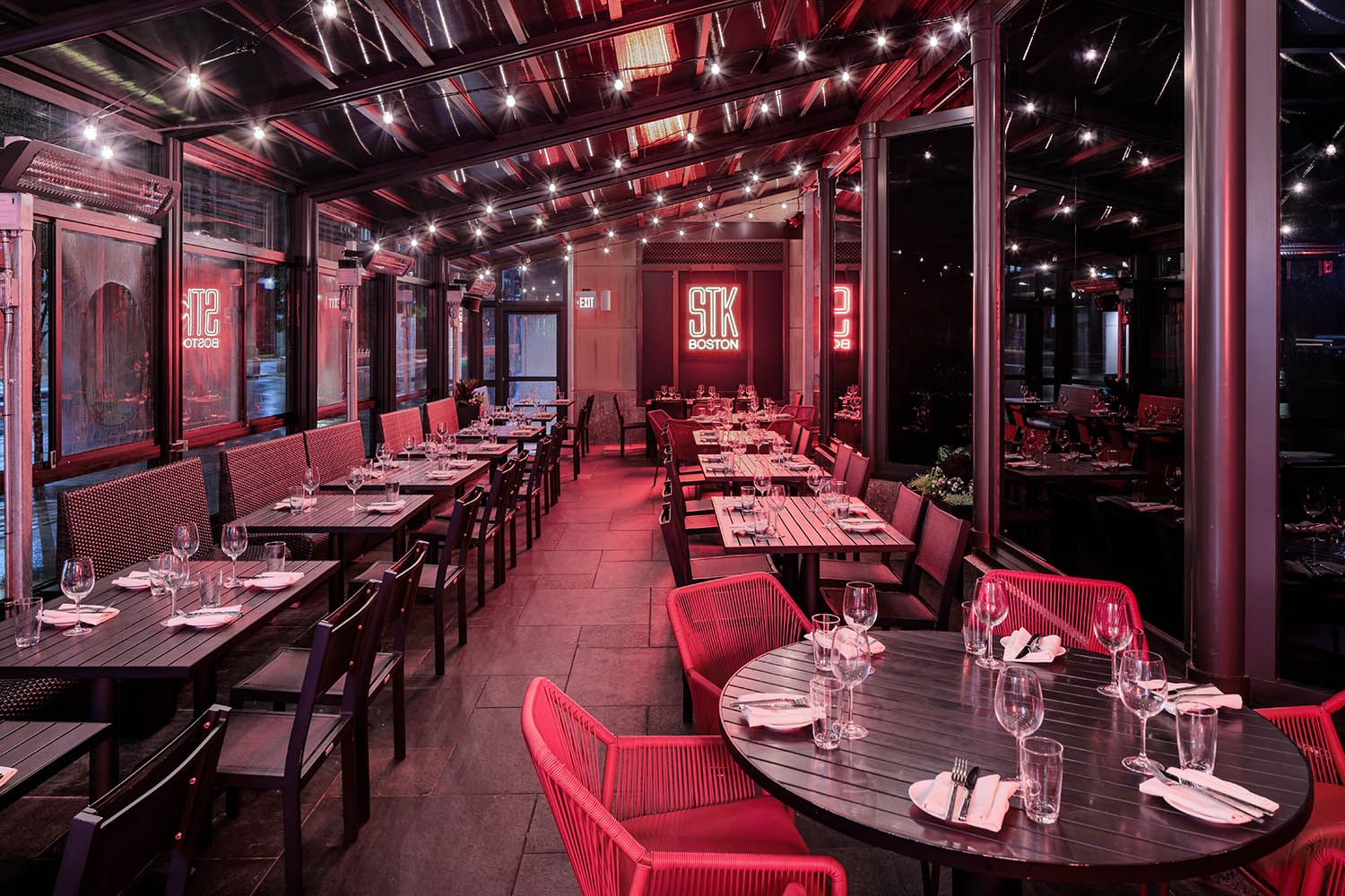 Boston restaurant photograph of side dining room details of STK location near Copley Sq to showcase architecture and layout of space.