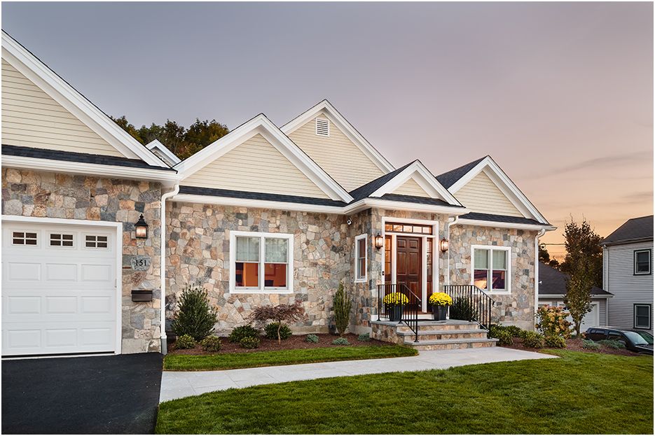 Exterior photograph taken by Boston architectural photographers, Roberto Farren residential home in Newton MA at dusk to show front of build
