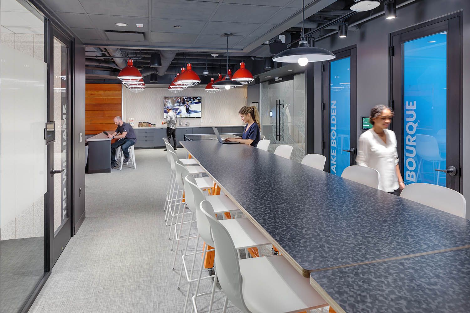 Downtown office renovation photo of corporate business location for architectural firm showing common space for staff to relax and break out