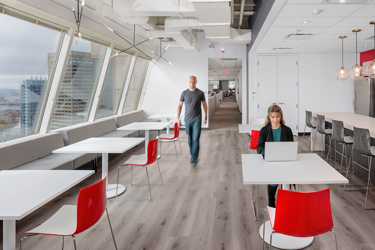 Boston architectural photographer walking through office scene in renovated work space