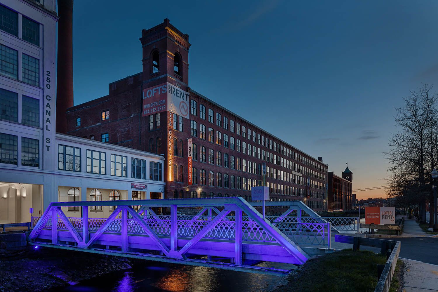 Boston architectural image showing exterior lighting and design of Lowell MA condo complex for Berkeley Investments
