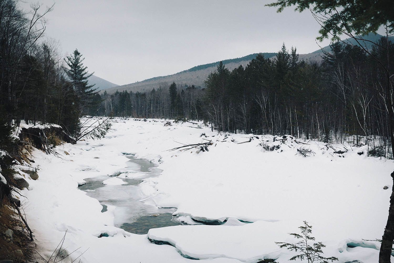 Color landscape photograph showing the White Mountains in New Hampshire winter by architecture and landscape photographer Roberto Farren