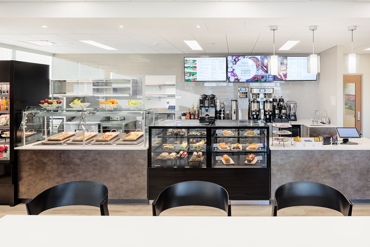 INTERIOR PHOTOGRAPHY SHOWING THE MAIN DINING AREA OF A NEW HEALTHCARE FACILITY LOCATED OUTSIDE BOSTON MA USA