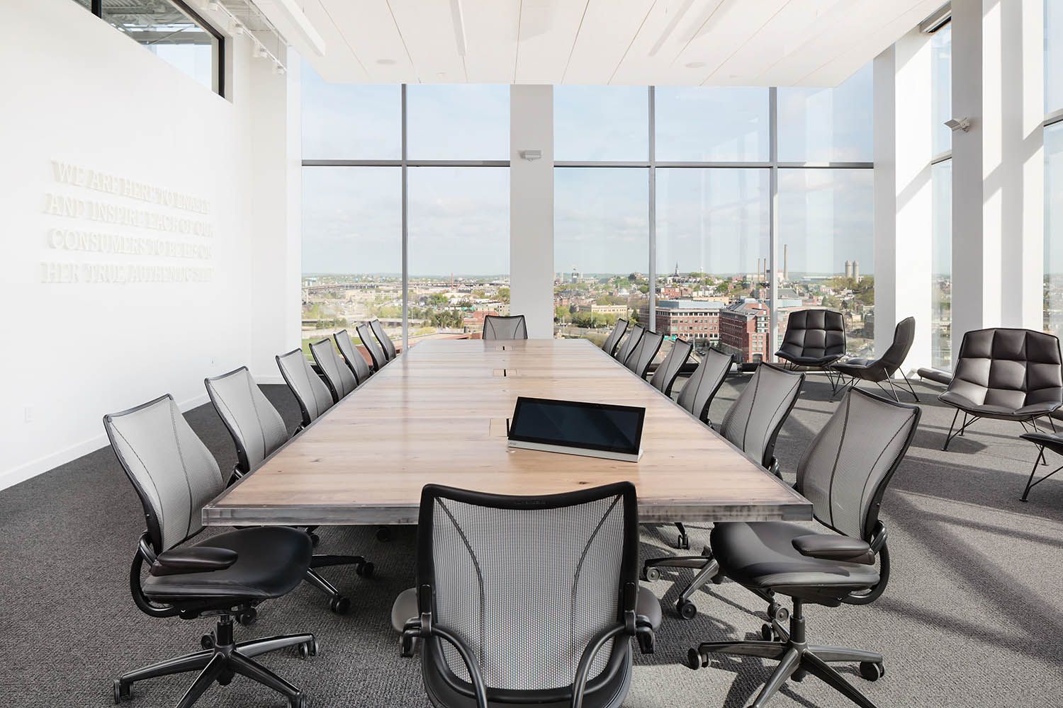 Converse Boston HQ interior architectural office space photography of the main board room on the top floor with view over the city.