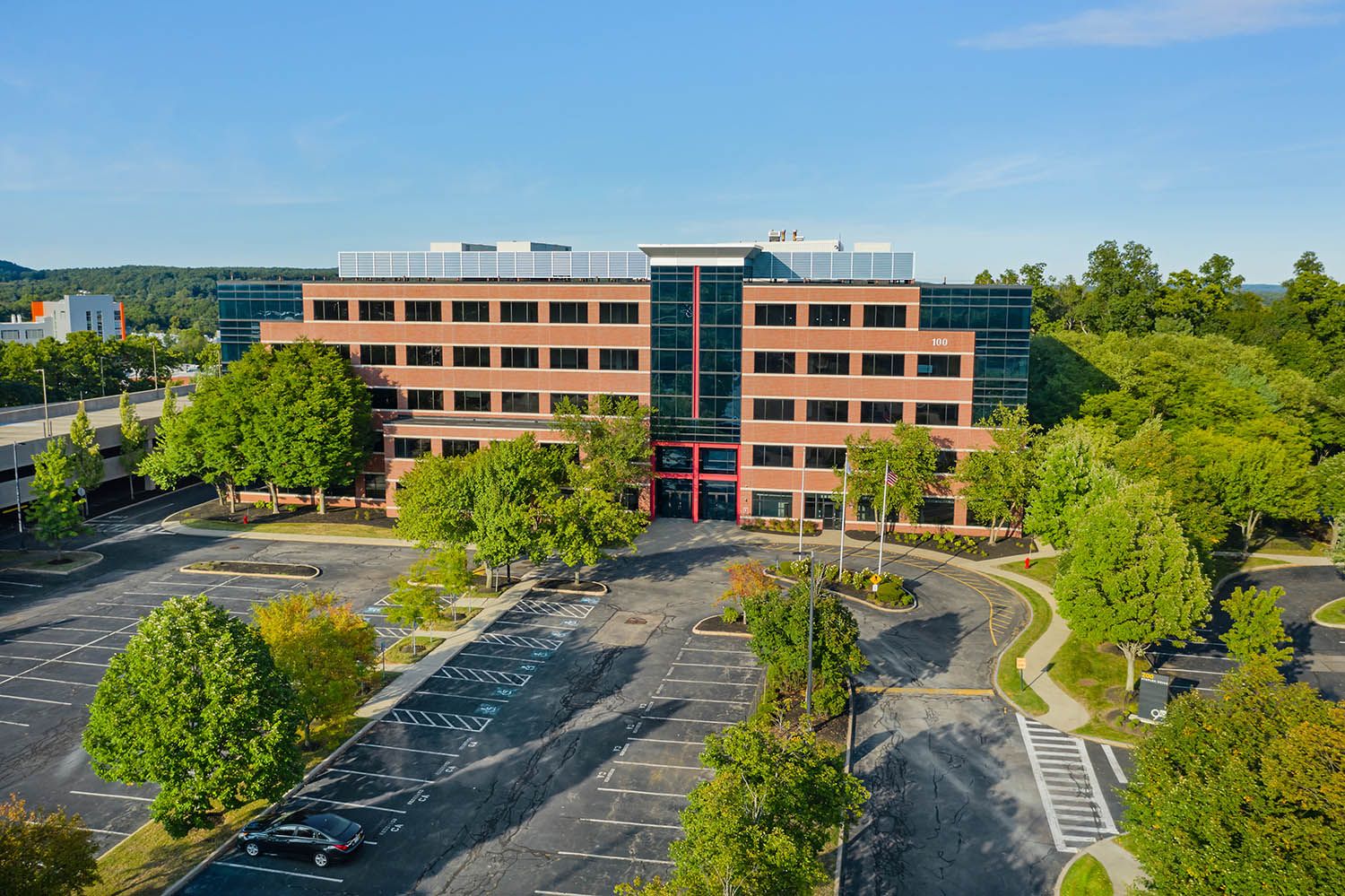 Architectural Drone image for commercial real estate purpose to show an large office building that is for sale.
