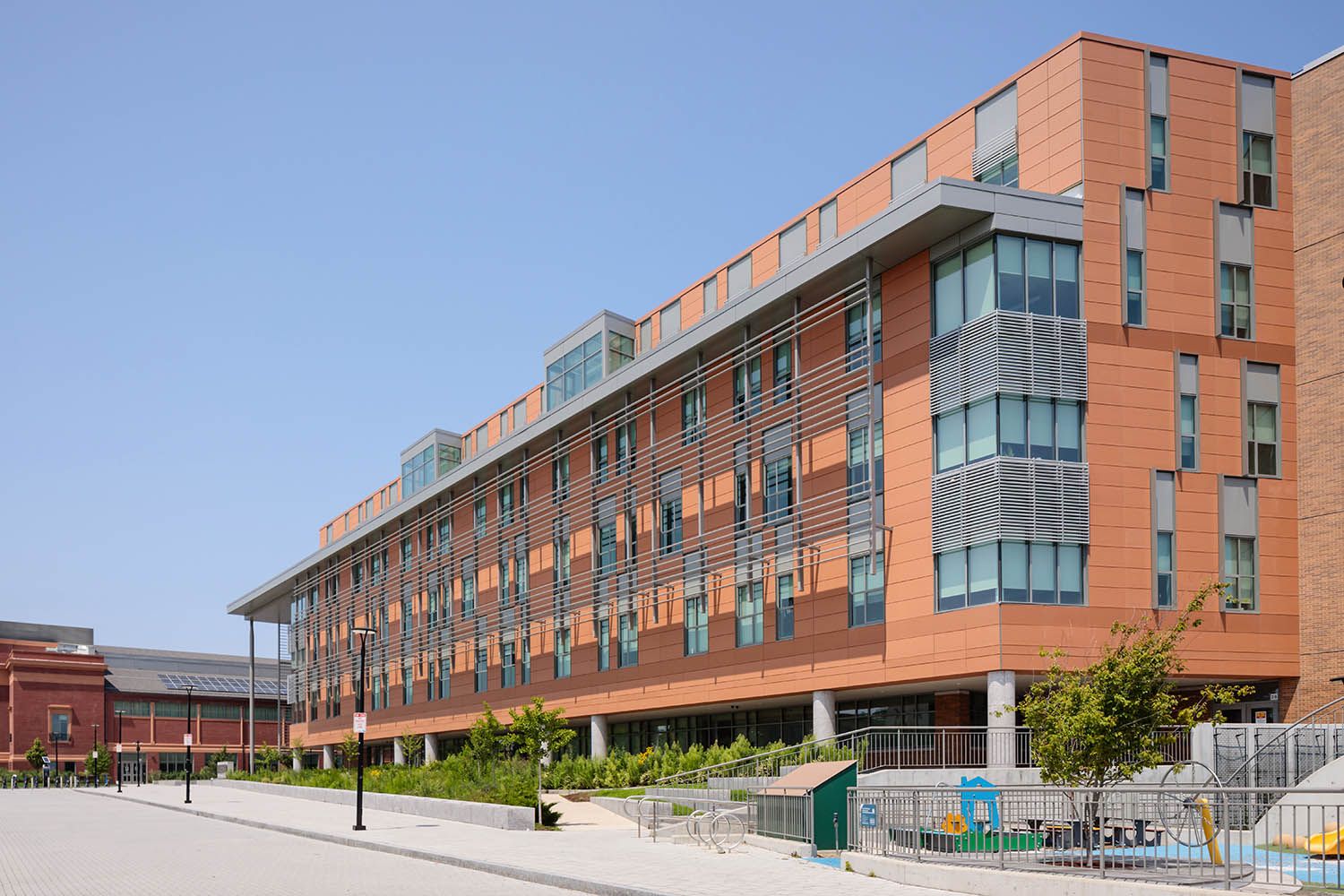 Exterior architectural image of new Somerville school build near Boston MA to show the location, design and materials used in this new space