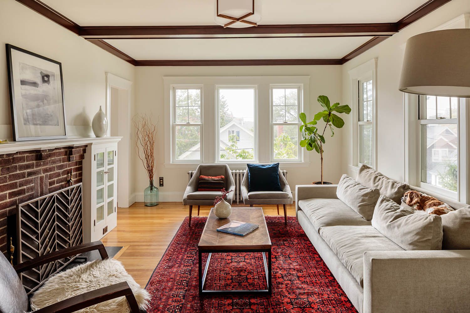 Residential architectural images taken for Boston area architects showing interior living room space with fireplace and furniture installed.