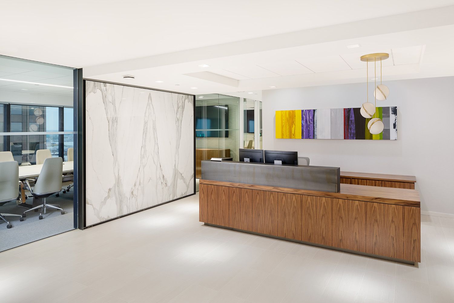 THE RECEPTION DESK OF A NEWLY DESIGNED AND INSTALL BOSTON LAW FIRM BY A ARCHITECTURAL COMPANY HERE IN MASSACHUSETTS