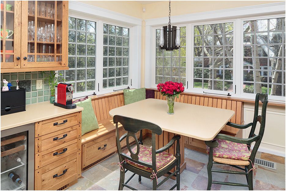 Architectural photograph of Boston home renovations in Newton, showing the kitchen dining area of this new kitchen installation for GC
