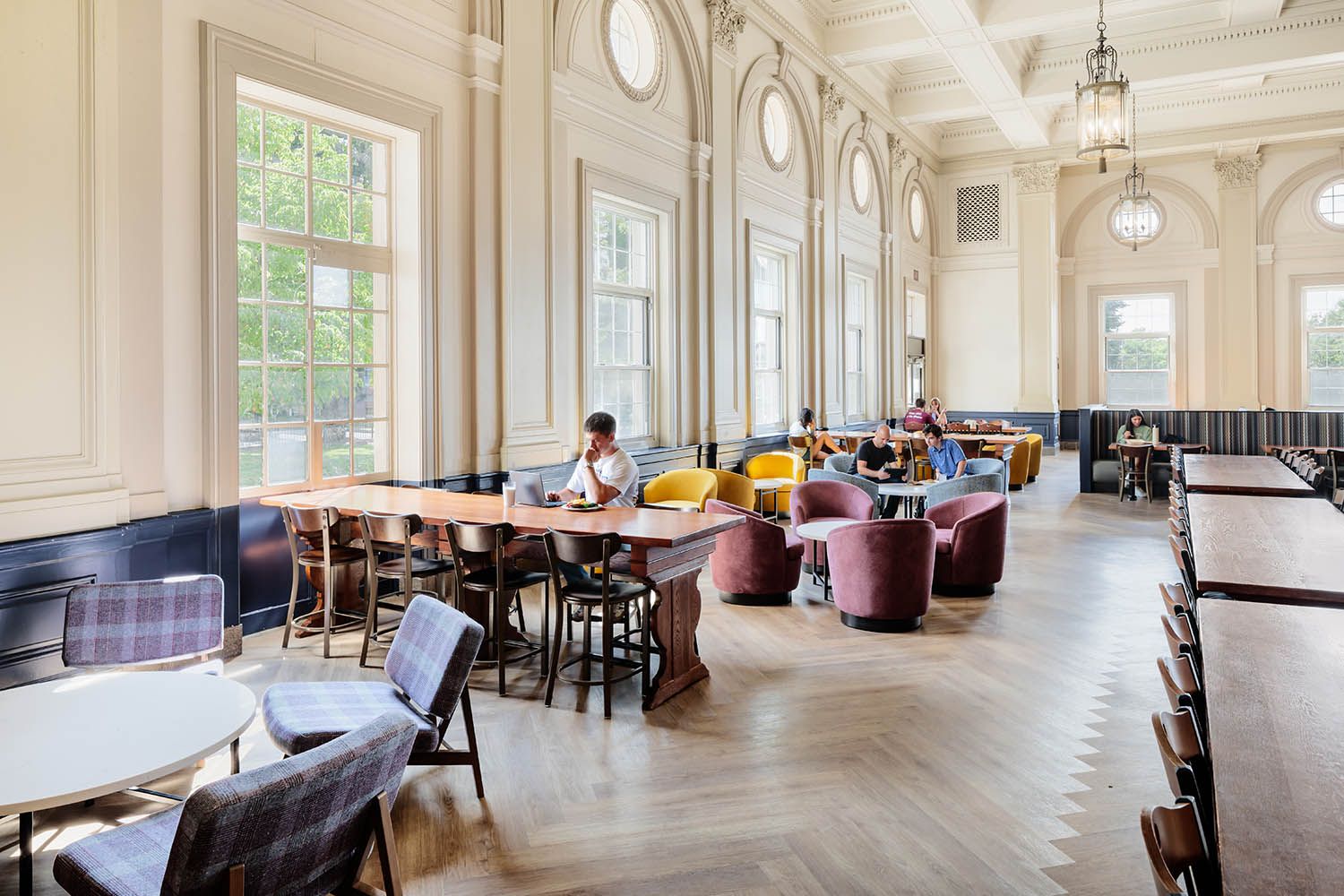 Boston architectural photograph by Roberto Farren of Holy Cross in Worcester MA dining hall with students studying
