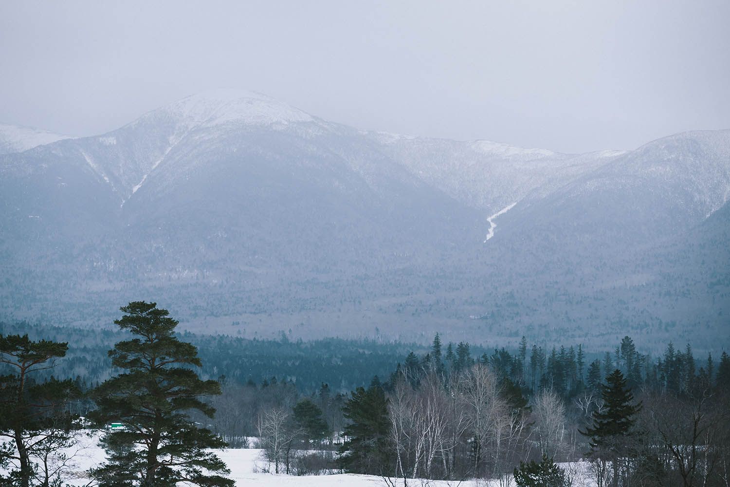 Color landscape photograph showing the White Mountains in New Hampshire winter by architecture and landscape photographer Roberto Farren
