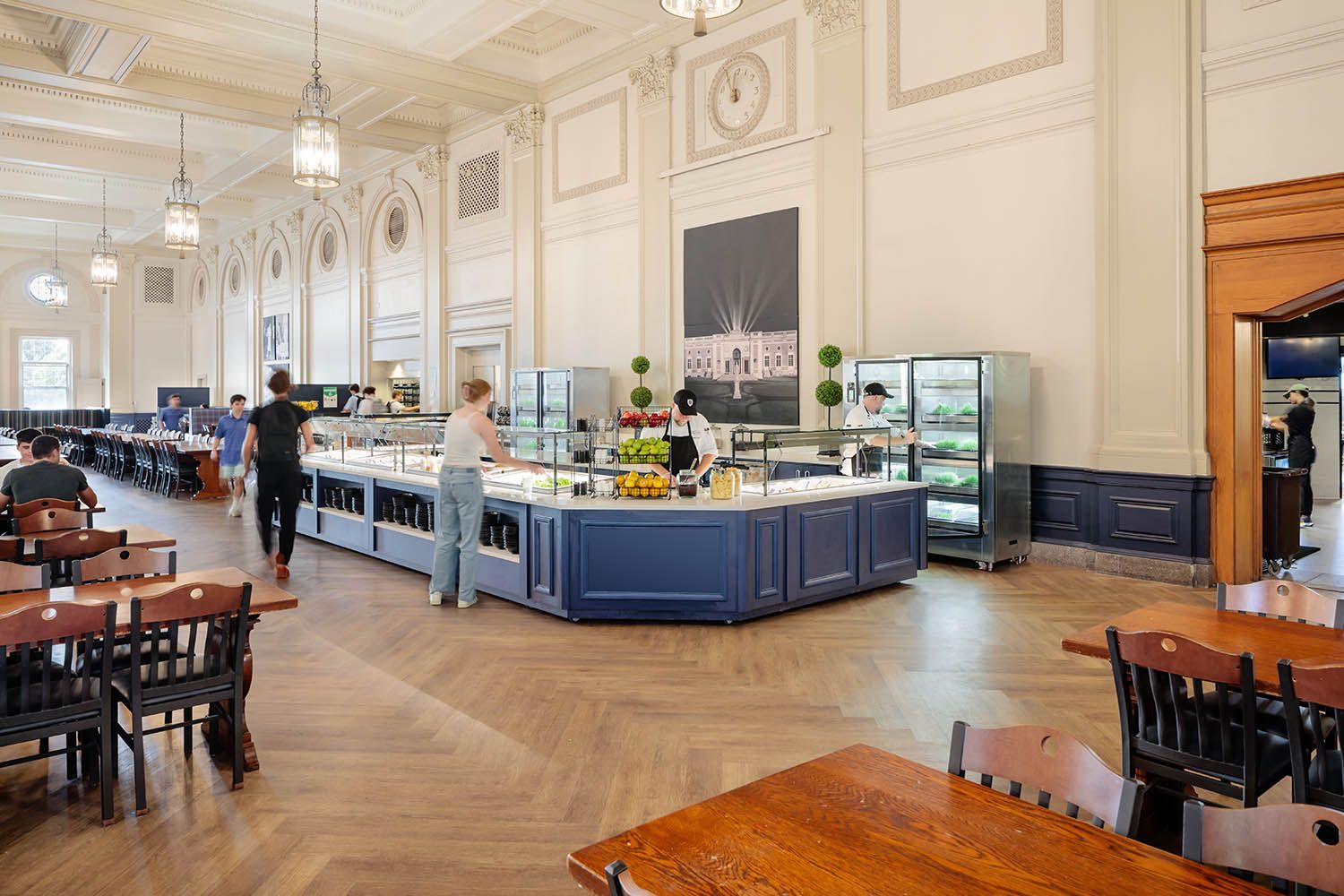 Architectural college photography of main dining room at Holy Cross in Worcester MA to show buffet selection and seating areas.