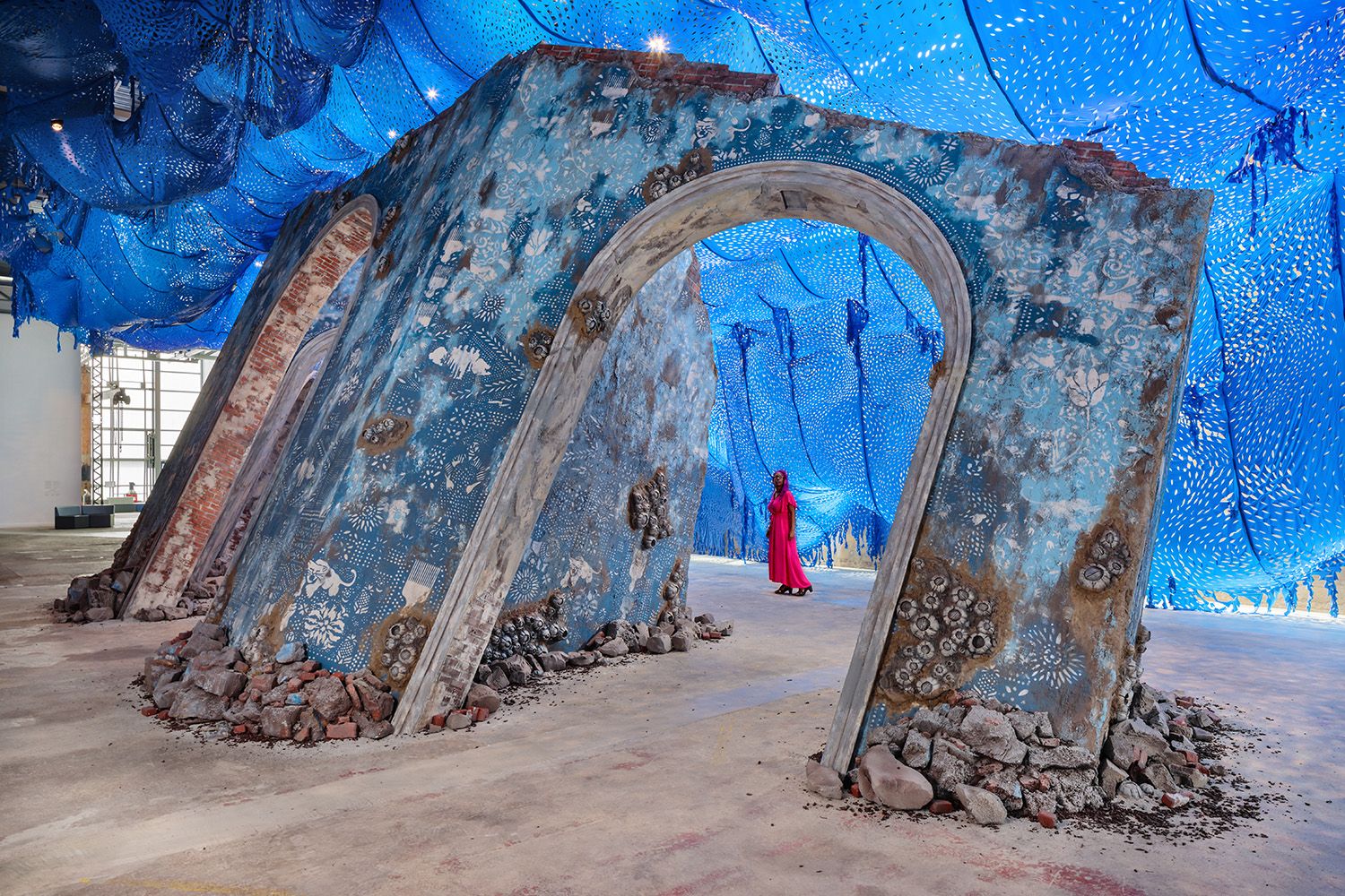 SINGLE PERSON FEATURED IN ARCHITECTURAL IMAGE OF ART WORK TO SHOW SCALE LOCATED IN BOSTON MA
