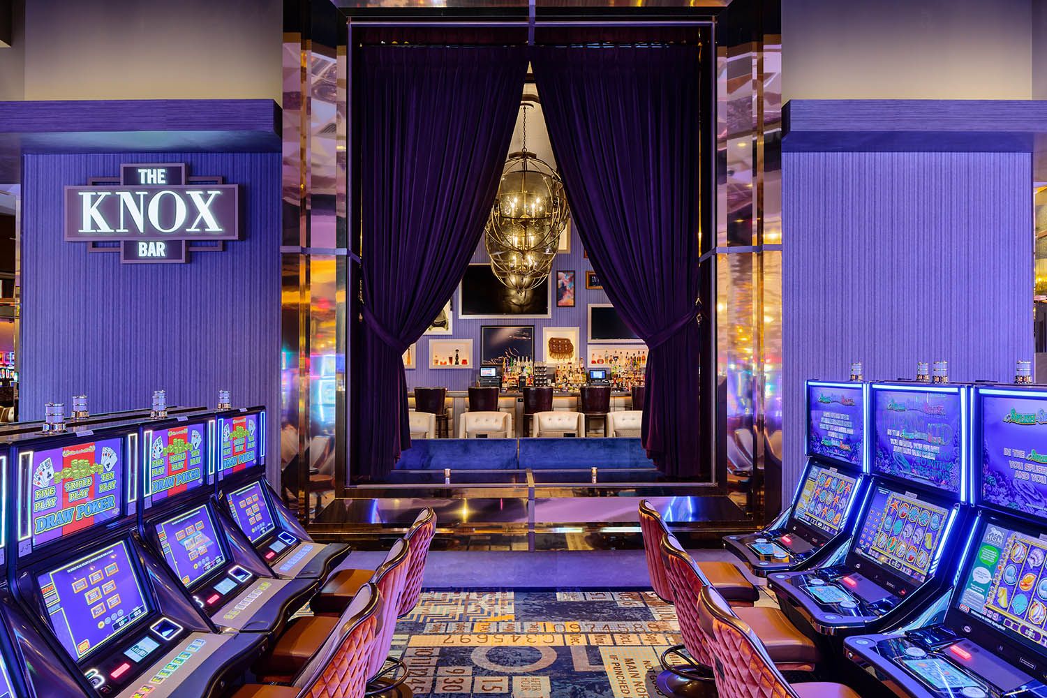 Architectural photography of MGM Casino in Springfield MA,  casino slot machines and room design and layout with view to rear room