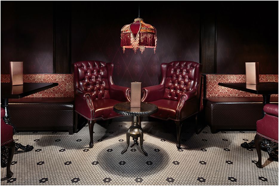 Architectural restaurant and bar photography of Carrie Nation in downtown Boston MA showing  intimate seating area for two people