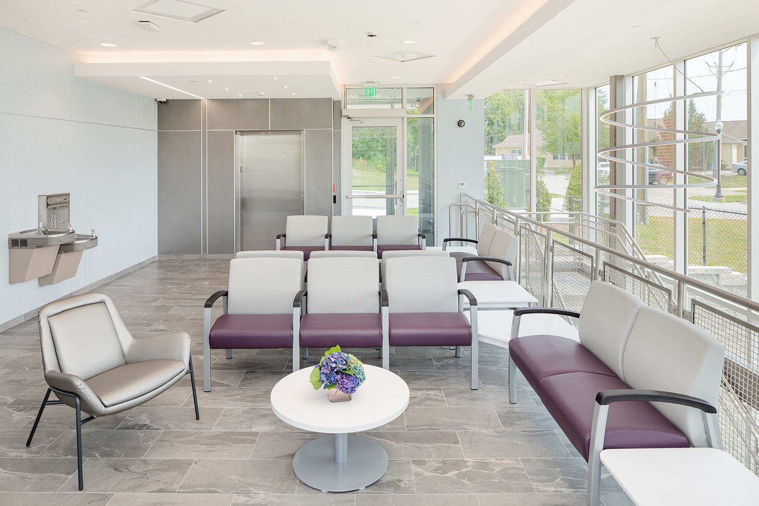 AN ADDITIONAL WAITING AREA PHOTOGRAPH TO SHOW THE ARCHITECTURAL DESIGN ELEMENTS INCORPORATED INTO NEWLY OPEN HEALTHCARE FACILITY IN BOSTON