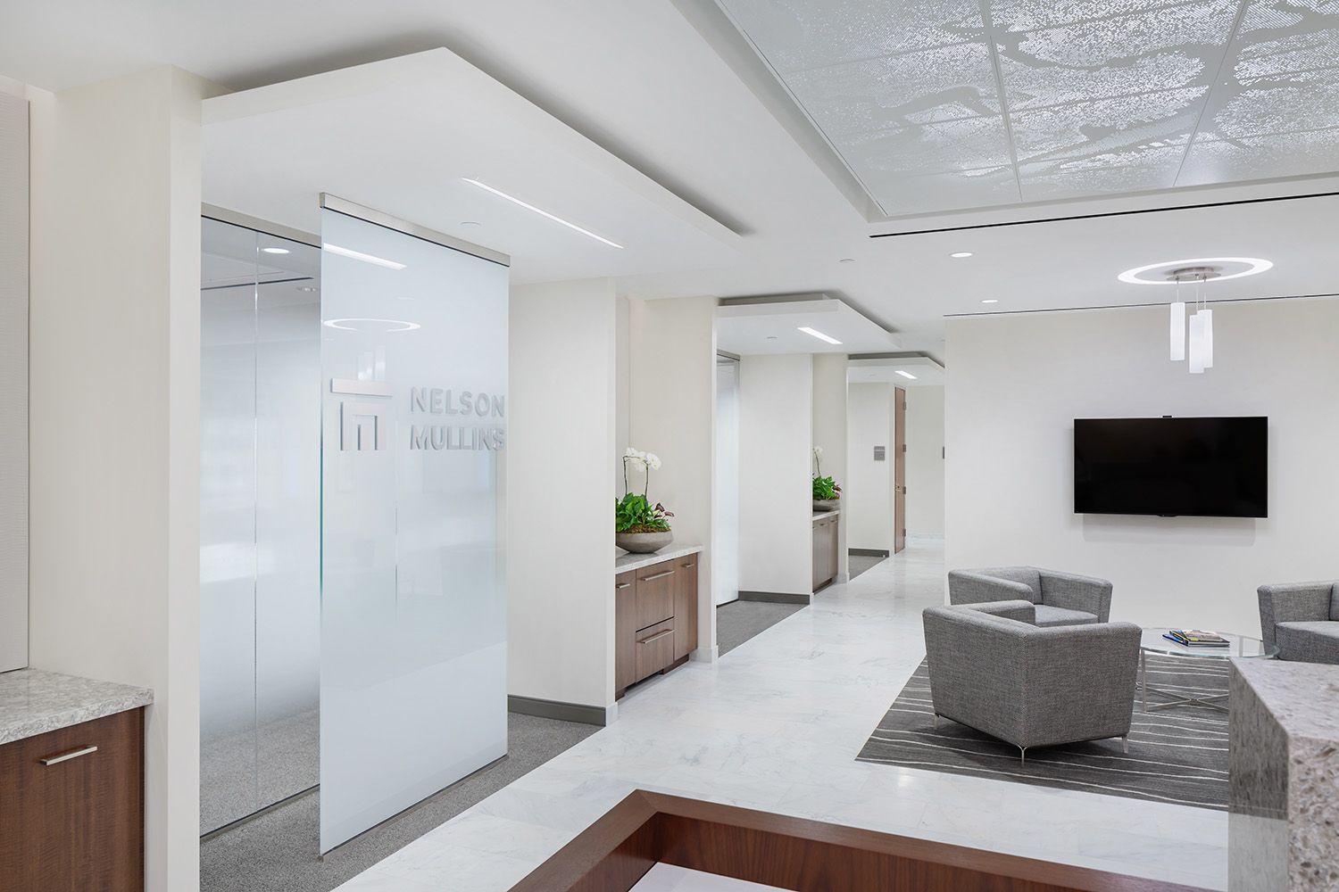 NEW BOSTON OFFICE BUILD OUT SHOWING THE INTERIOR SPACE WITH HIGH KEY LIGHTING TO SHOW THE ARCHITECTURAL FEATURES