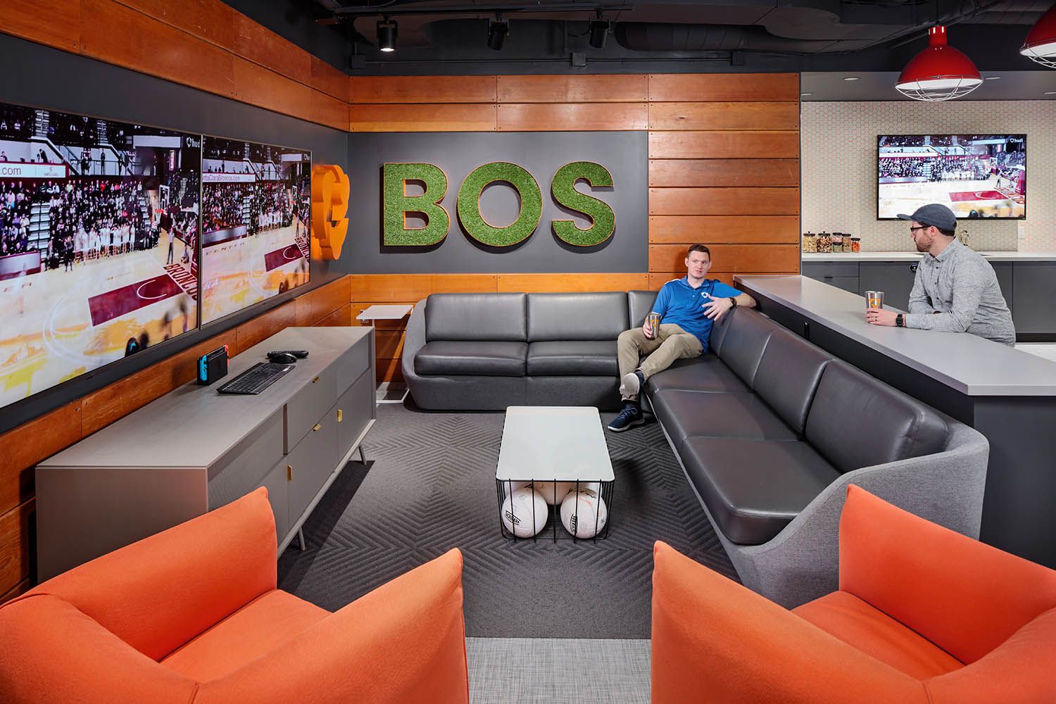 Downtown office renovation photo of corporate business location for architectural firm showing common space for staff to relax and break out