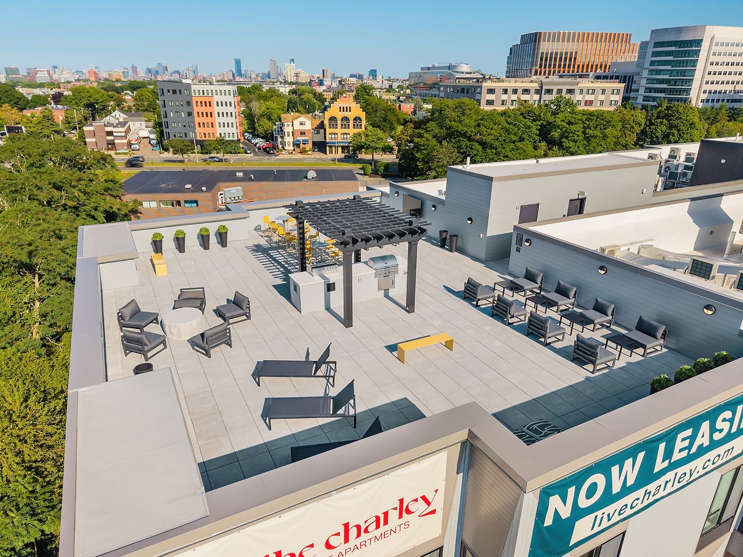CLOSE UP ARCHITECTURAL DRONE CAPTURE OF ROOF DECK ON A BOSTON RESIDENTIAL COMPLEX