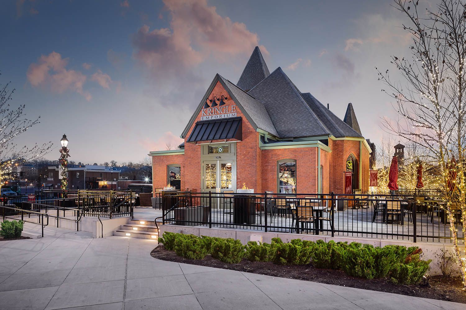 Architectural photograph of MGM Casino in Springfield MA showing one of the onsite stores located on the grounds of the building at dusk
