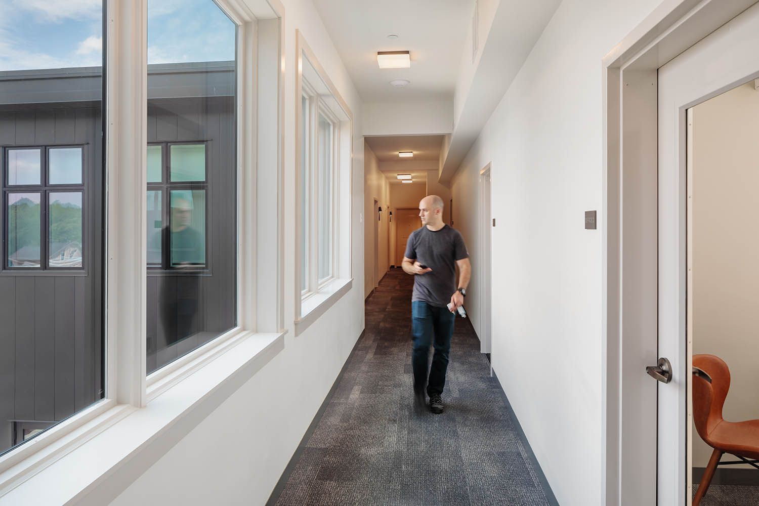 Architectural image taken for Boston area architects Bergmeyer of a new office to residential conversion in Medford common area corridor