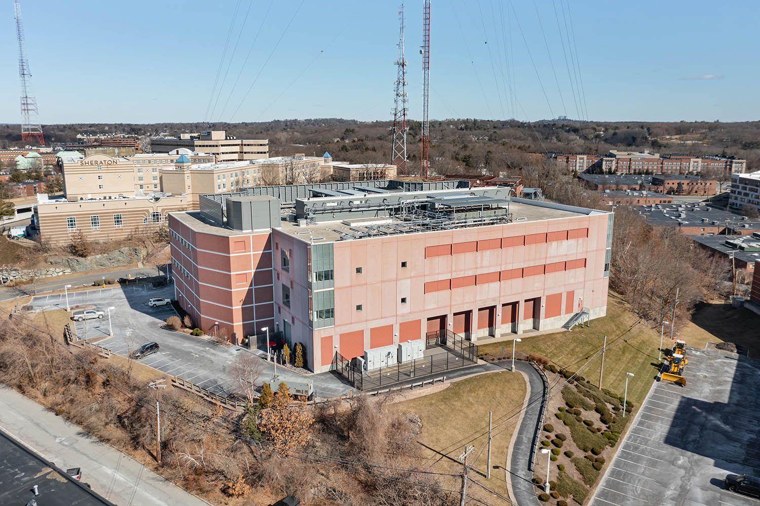Architectural Drone image of data center near Boston MA. Aerial photo to show scale of building and access links.