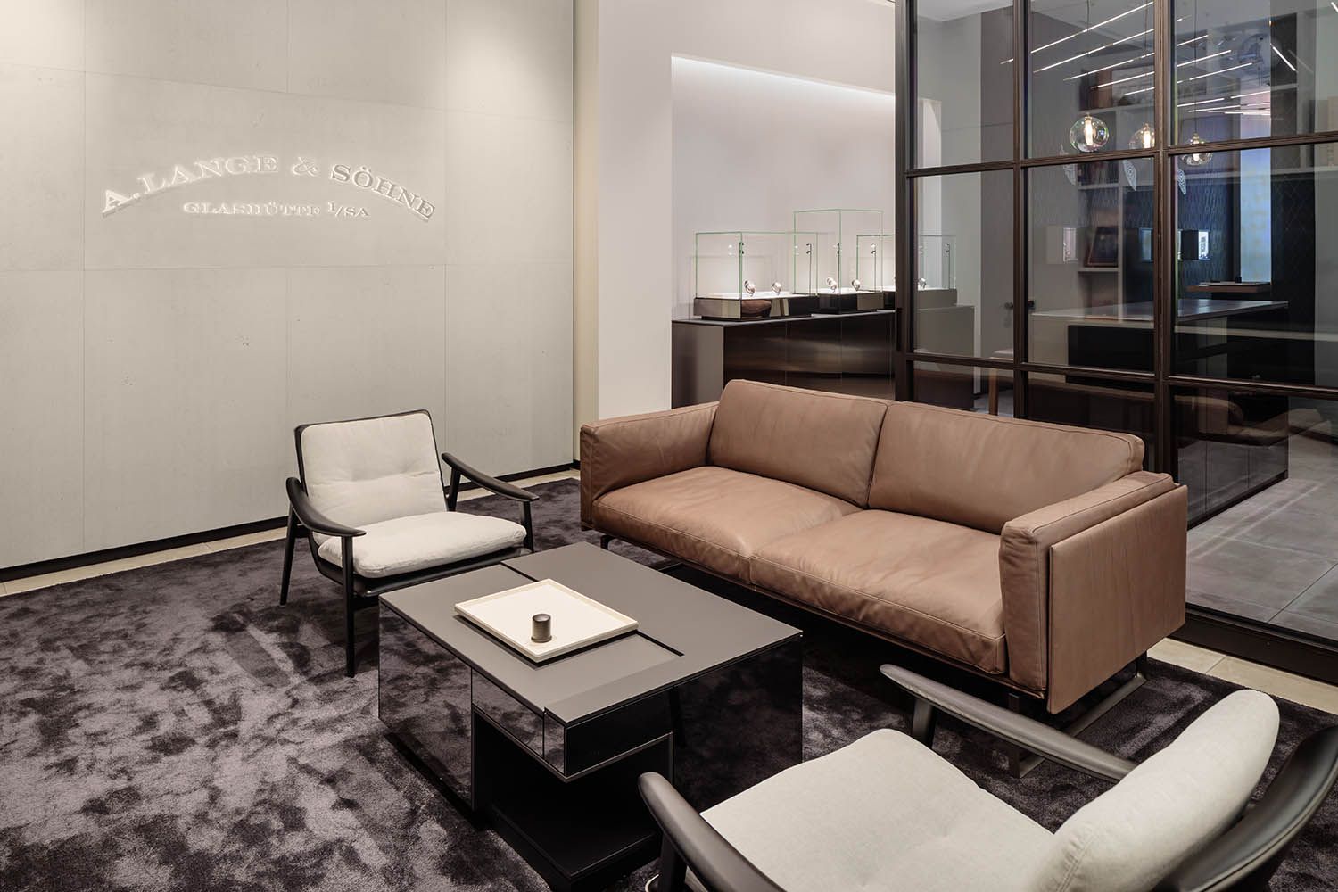 Retail space photograph of Boston watch store on Newbury St in the city by architectural photographer Roberto Farren lounge and review area