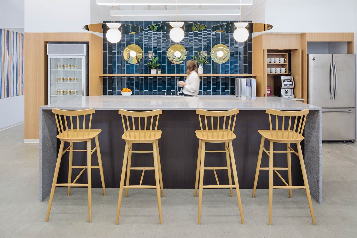 New office photography shoot for Bergmeyer of a newly renovated and designed office space in Allston Boston MA. Shows kitchen area for staff