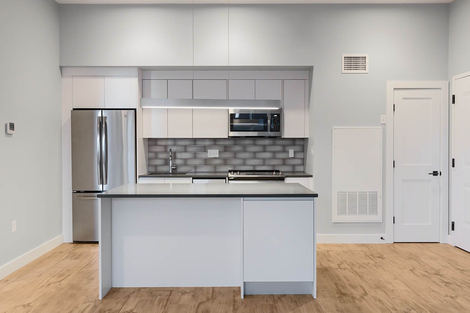 Architectural image taken for Boston area architects Bergmeyer of a new office to residential conversion in Medford kitchen interior