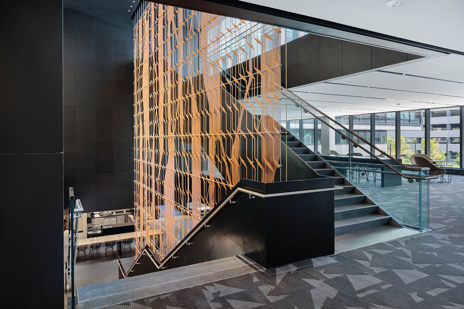 New office and life sciences building in Waltham MA architectural photography of staircase and art install for Boston building developers
