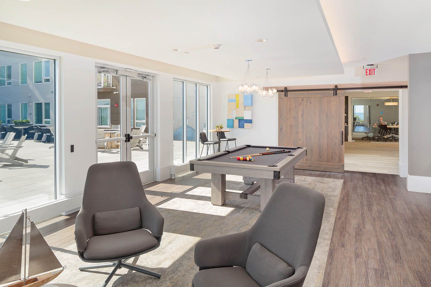 Interior architectural image taken for Boston area real estate agent showing pool tables other common area use, Revere MA