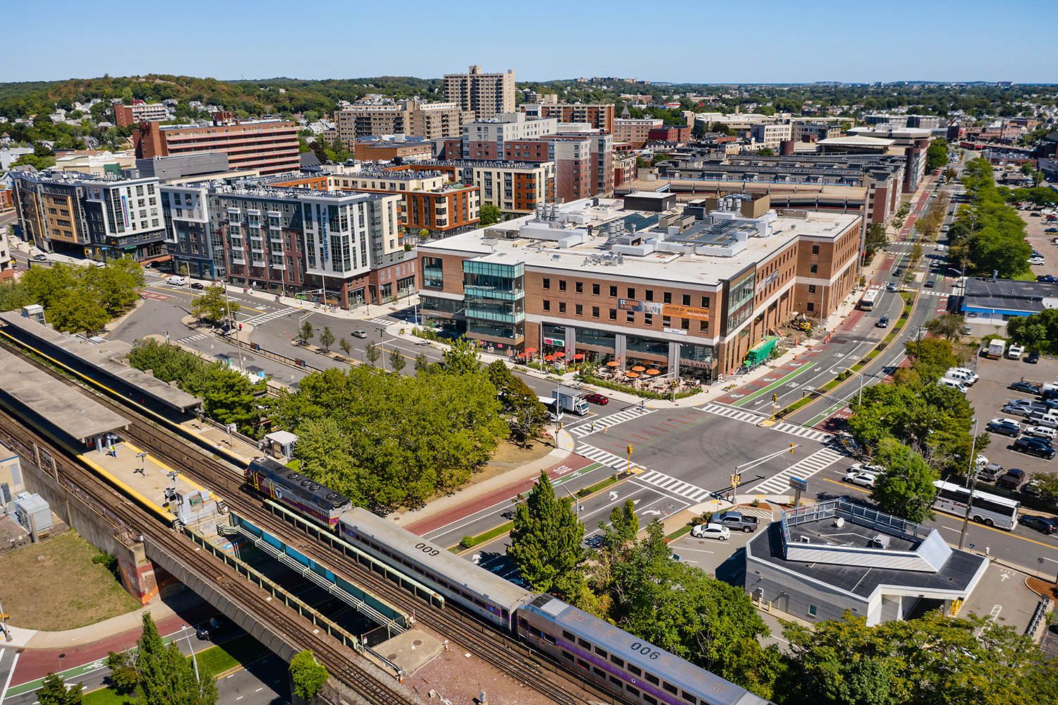 Architectural Drone image taken in Malden MA of new life sciences facility developed there. Train line to demonstrate transport connections
