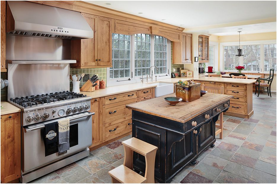 Architectural photograph of Boston home renovations in Newton, showing the main kitchen changes to this now beautiful country style install.