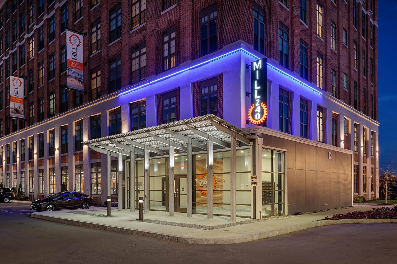 Architectural image taken for Boston area development company of residential units converted from old mills in Lowell MA main entrance night