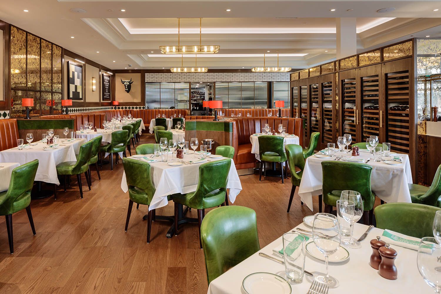 Architectural Image for Boston area restaurant showing the main dining area and wine storage and view to the kitchens.