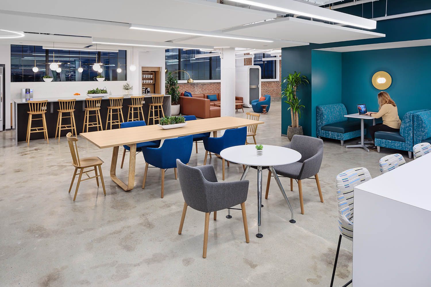 New office photography shoot for Bergmeyer of a newly renovated and designed office space in Allston, Boston MA. Shows main breakout area.