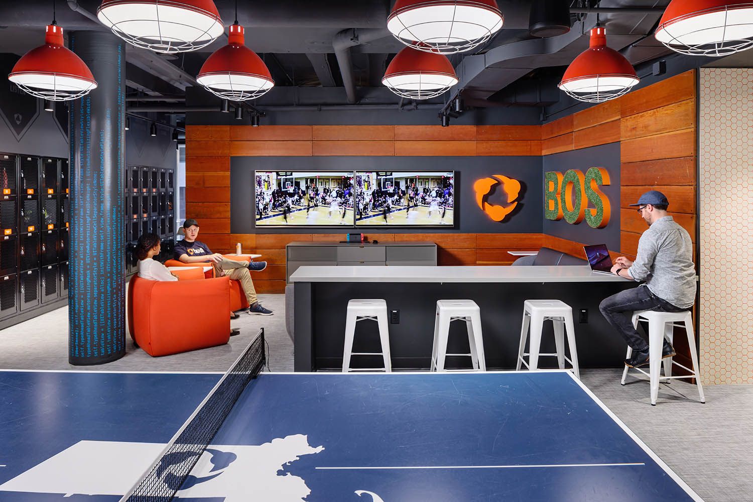 Downtown office renovation photo of corporate business location for architectural firm showing common space for staff to relax and break out