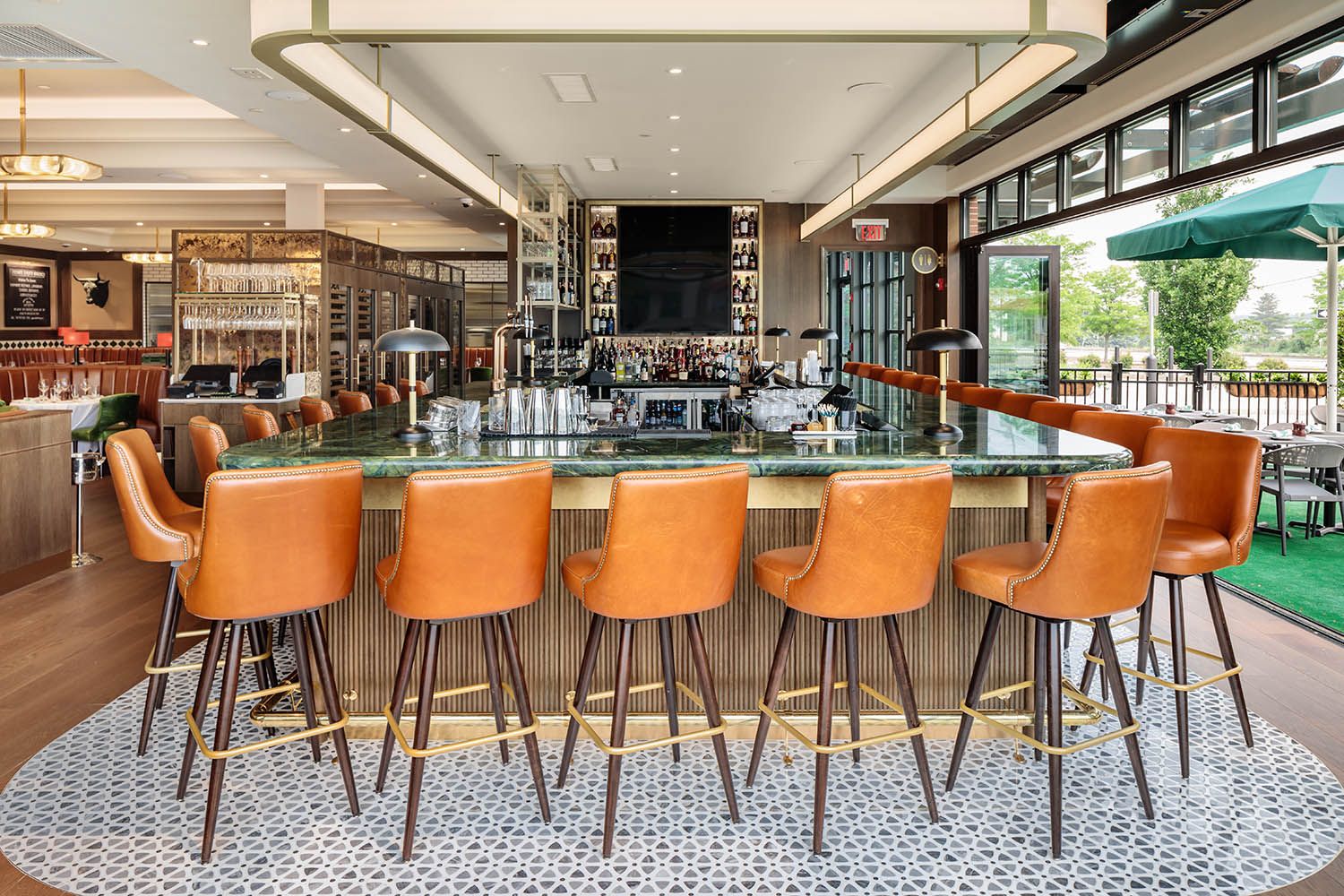 Architectural Image for Boston area restaurant showing the main downstairs bar area and patio access