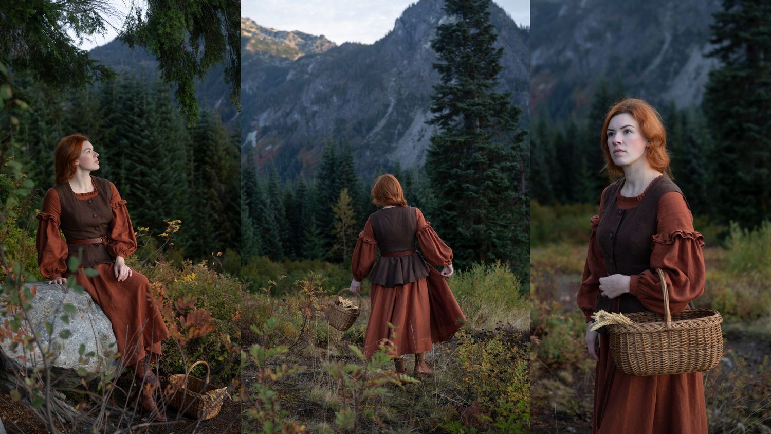 Rich burgundy period dress photographed against a dramatic mountain landscape with evergreen trees.