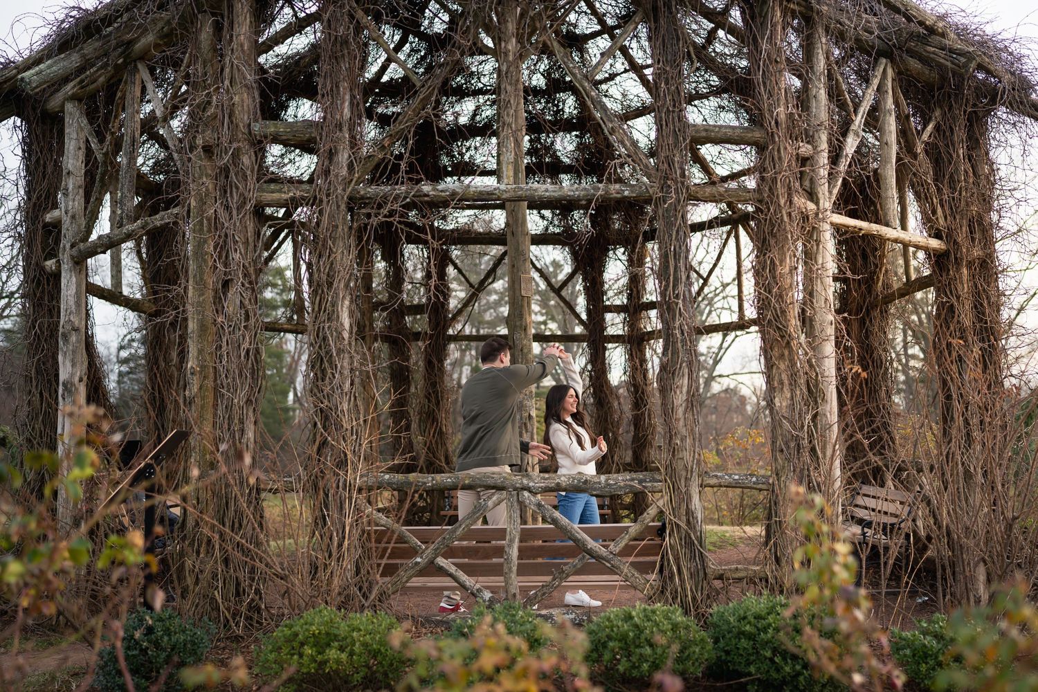 winter engagements photo session in elizabeth park photos of couple dancing in hut