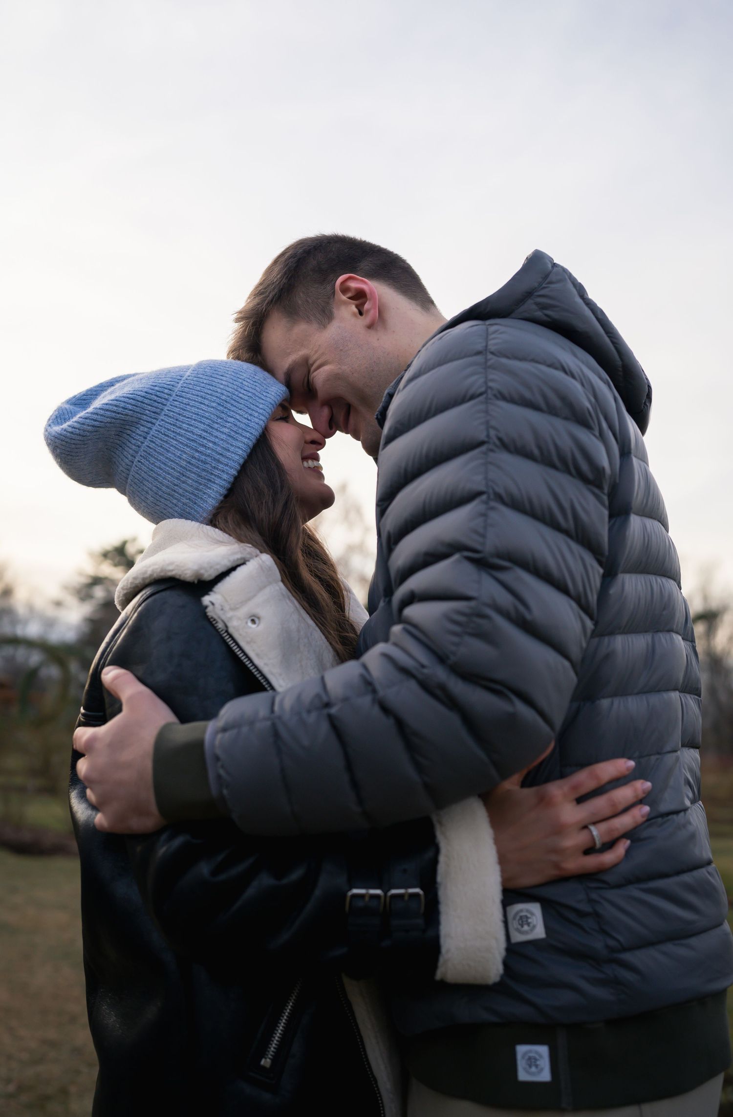 winter engagements photo session in elizabeth park photos of couple embrace 2