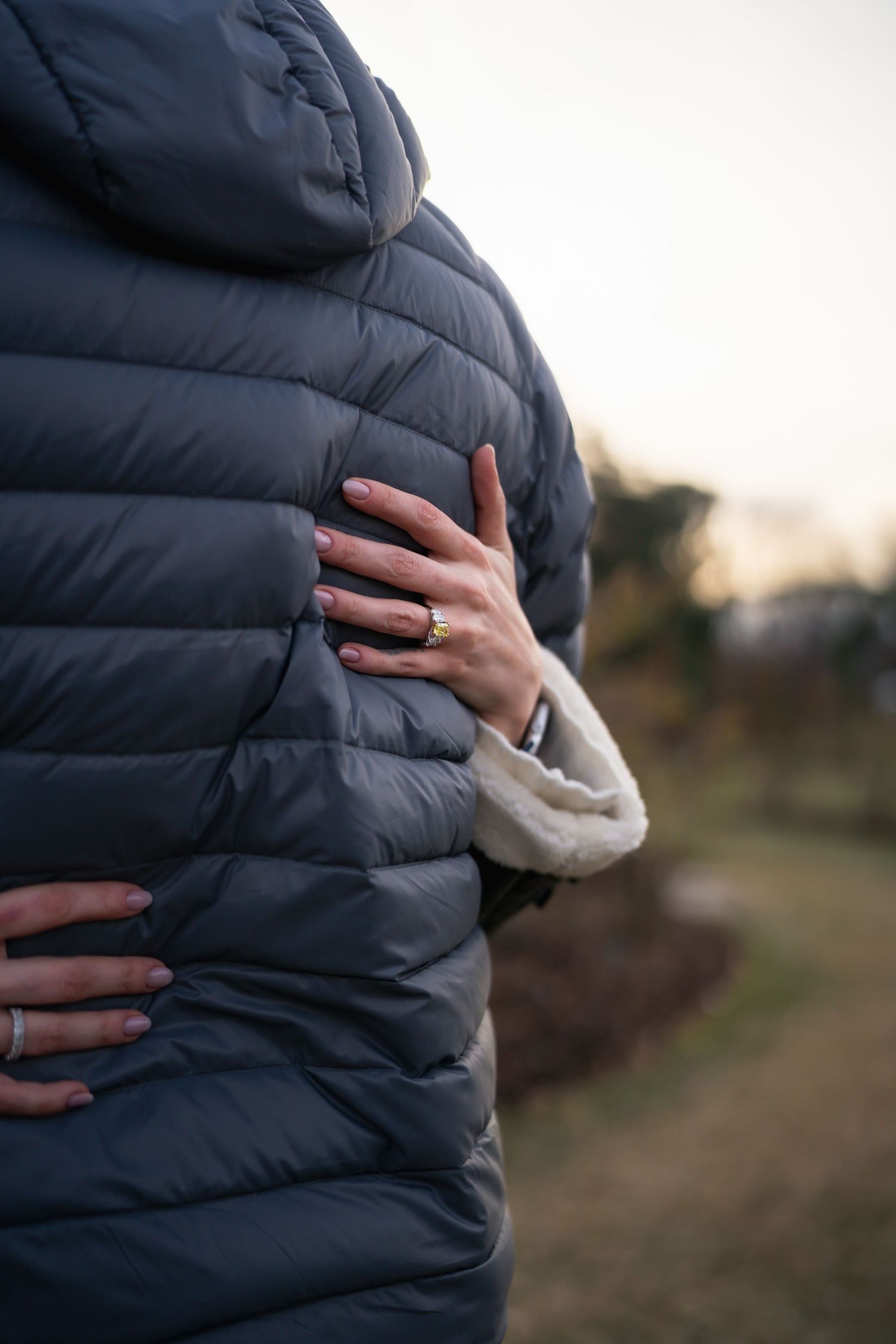 winter engagements photo session in elizabeth park photos of couple embrace
