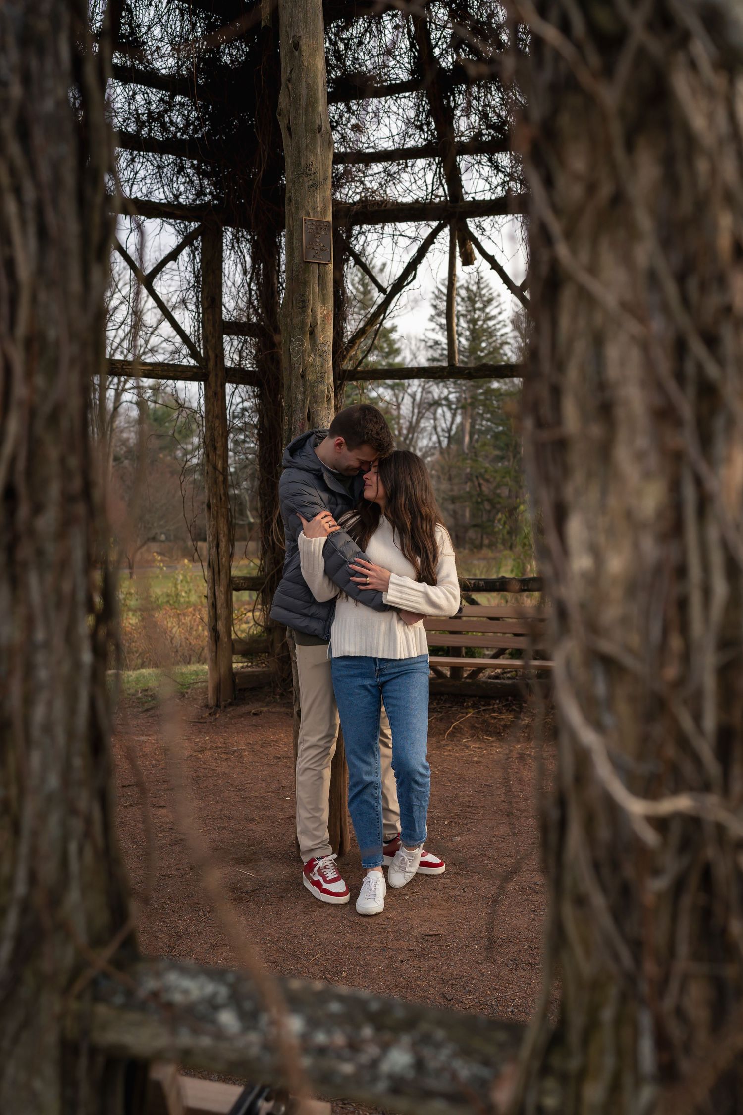 winter engagements photo session in elizabeth park photos of couple embracing in hut