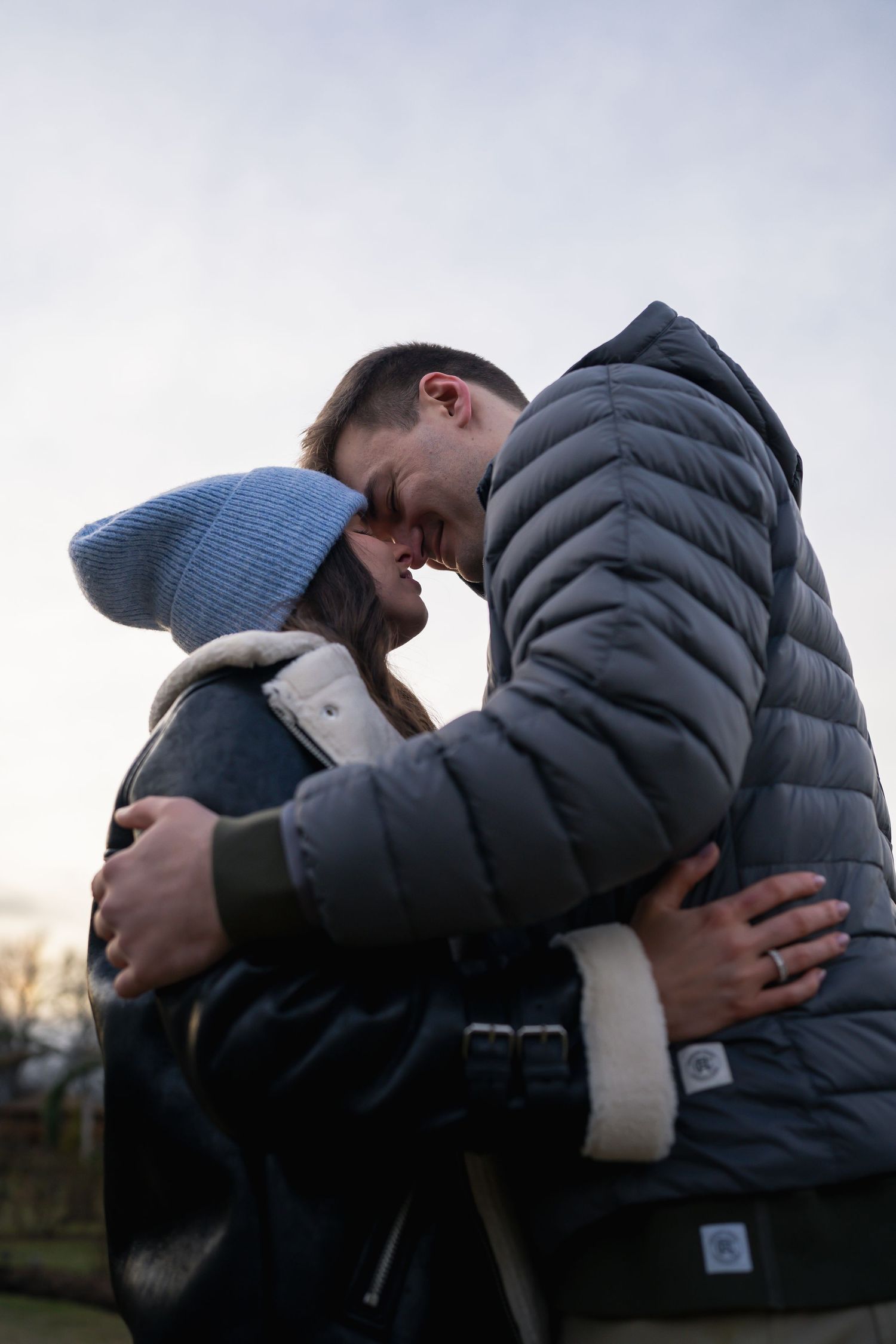 winter engagements photo session in elizabeth park photos of couple touching foreheads