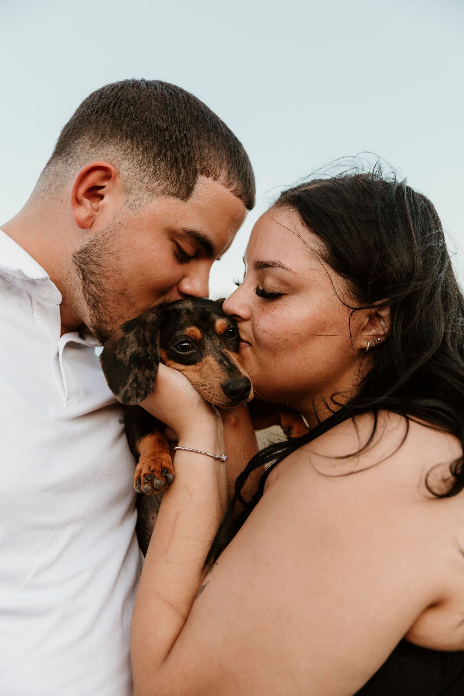 A loving couple shares intimate kisses in a series of romantic closeup photographs presented in a horizontal collage layout.